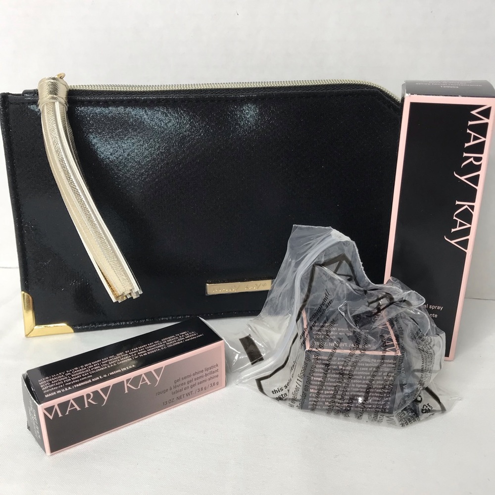 Mary Kay makeup bag lipstick, eyeliner, spray